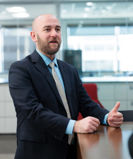 Man speaking while sitting